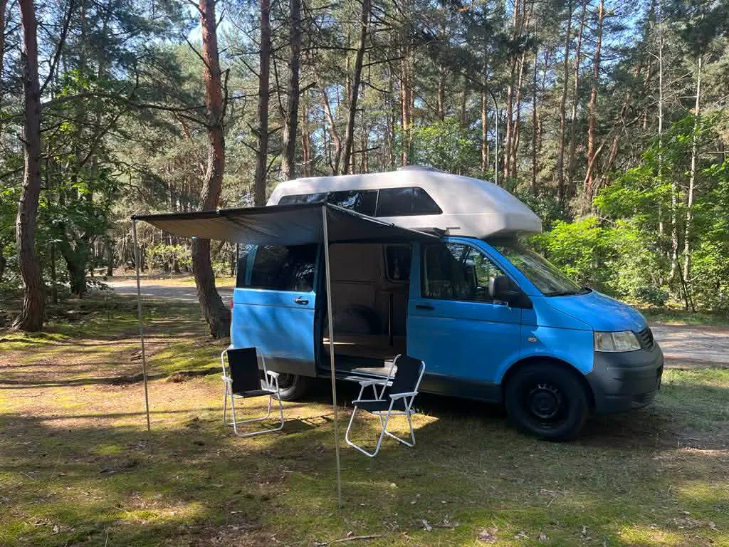 VW T5 at a campsite